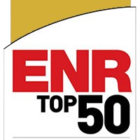 About the logo of "enr top 50" featuring bold red and white text on a partially visible yellow and white background.